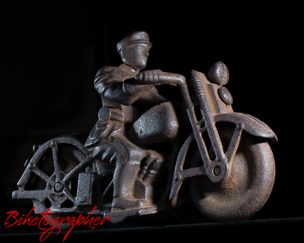 Cast iron motorcycle toy. Age unknown.